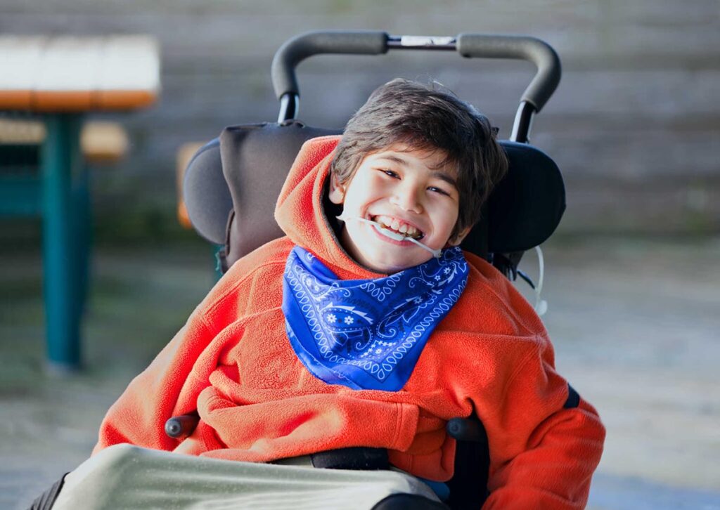 Happy kid with cerebral palsy