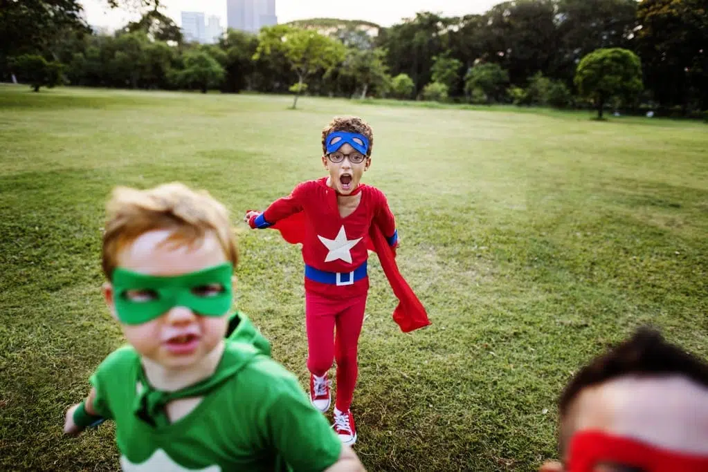 autistic kids wearing superhero costumes