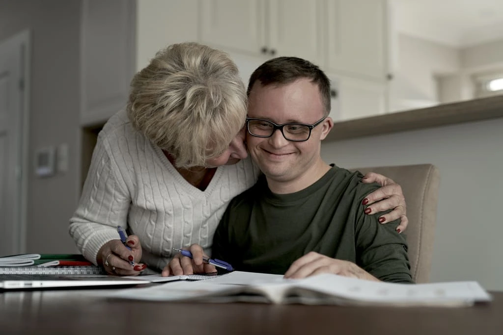 support worker helping a man with a learning disability