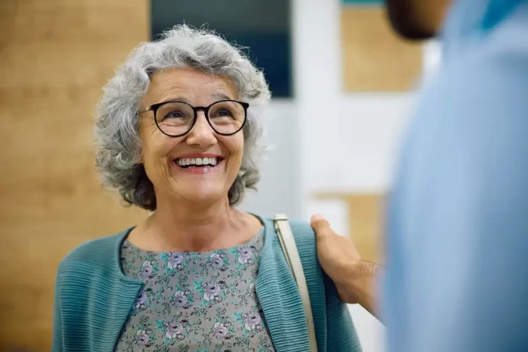 elderly woman laughing